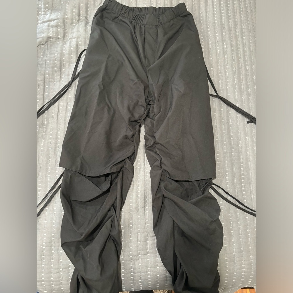 Black windbreaker jogger pants with strings. size L